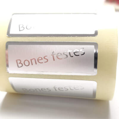 Etiqueta adhesiva " Bones Festes"  Català (500u.) Plata